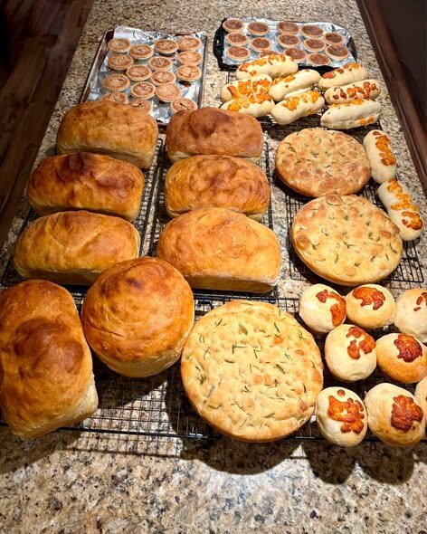 Rows of fresh loaves and focaccia